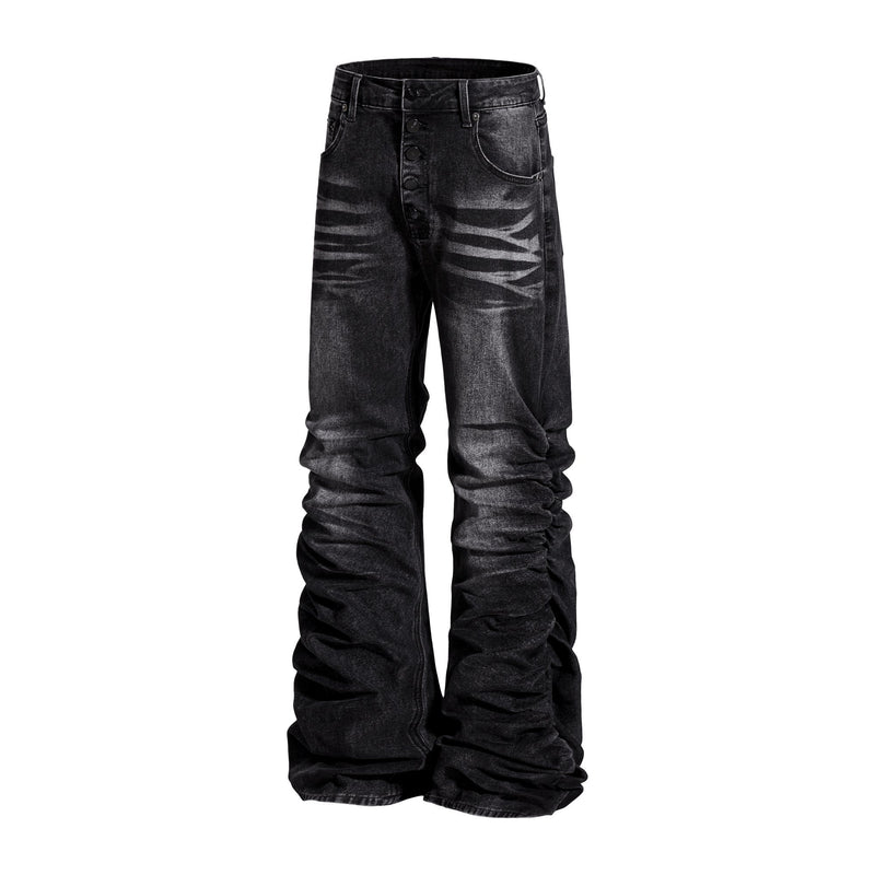Black washed flare jeans with stacked legs, front view and button fly