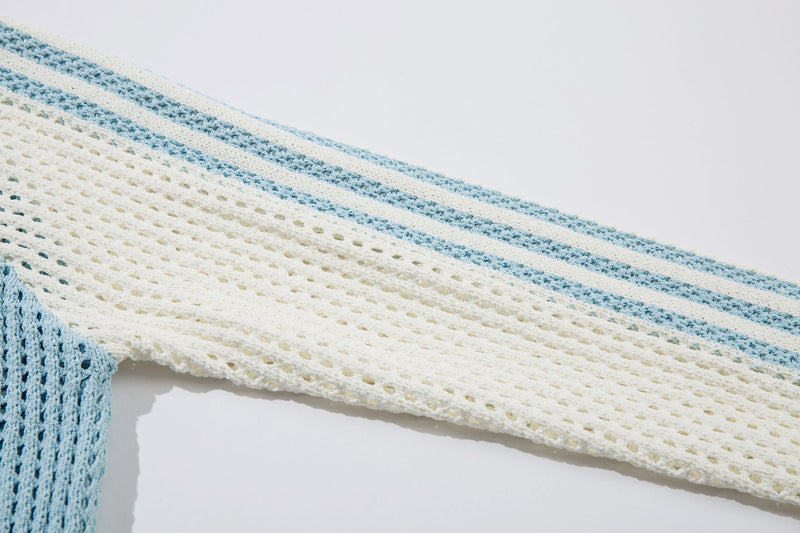 Close-up of light blue and cream striped sleeve on mesh knit jacket