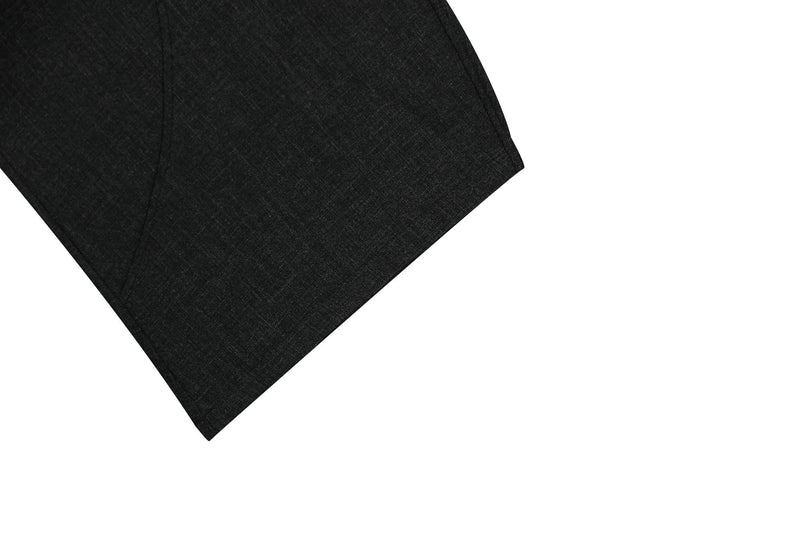 Close-up of black pant hem with wide leg opening and clean stitched edge