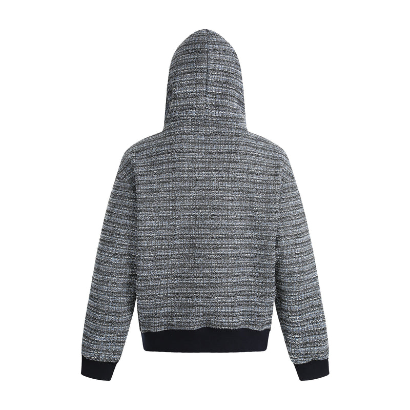 Back view of a gray textured knit hoodie with black ribbed hem and cuffs