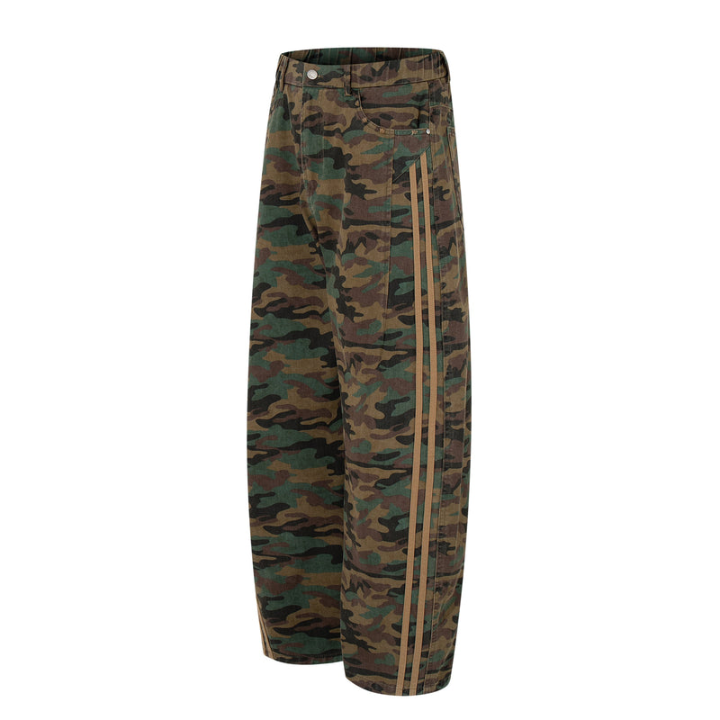 Angled front view of woodland camo wide-leg pants with triple side stripes