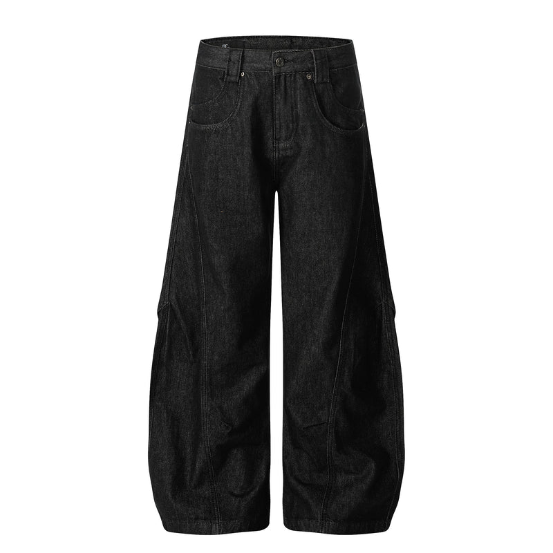 Black wide-leg jeans with balloon shape, front view showing structured panel seams and curved pockets