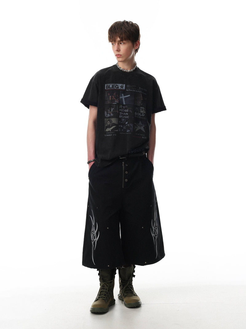Black vintage washed graphic T-shirt with collage-style music print, worn with wide black cargo pants and boots