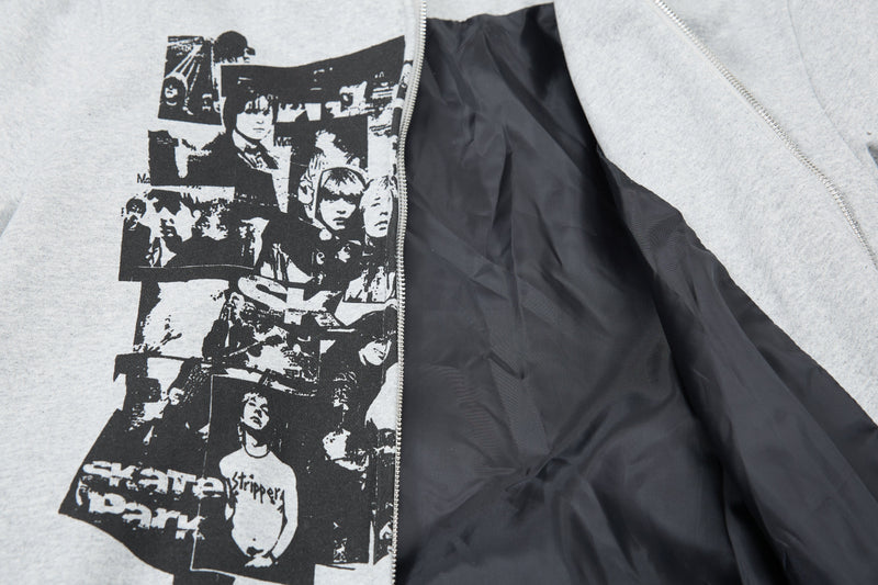 Open light gray zip-up hoodie showing black lining and collage print