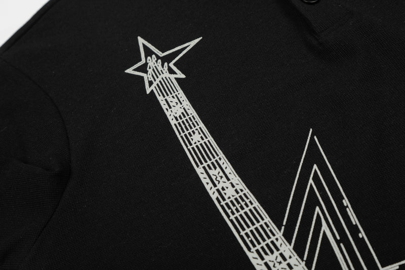 Black streetwear polo tee with white rock star graphic and leopard print collar detail