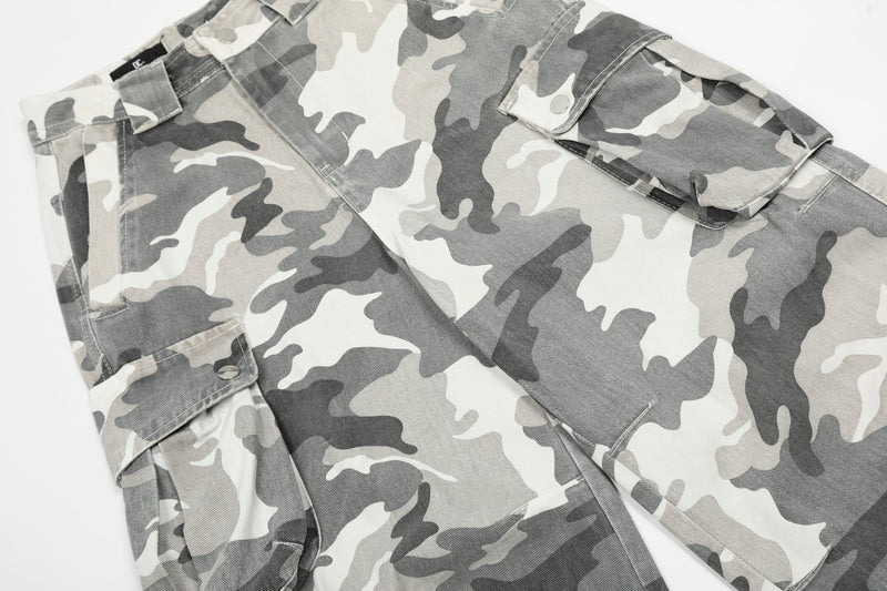 Close-up of the upper leg pocket area on gray camouflage cargo pants