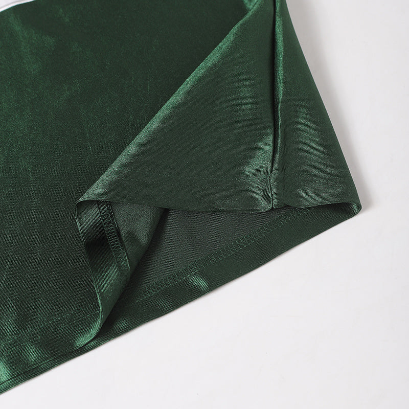 Dark green classic football jersey sleeve with stitched hem and smooth varsity-style fabric texture