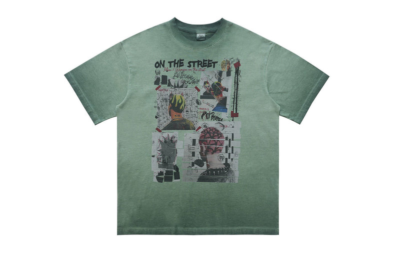 Vintage wash green graphic tee with street collage print and bold On the Street text on the chest