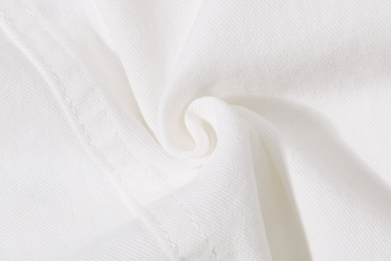 Close-up of white shorts fabric texture
