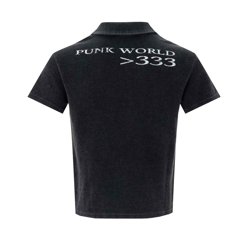 Black vintage washed polo tee with textured fabric and back print reading Punk World >333 on a white background