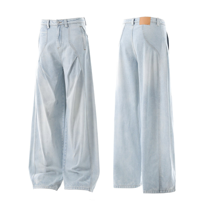 Light wash wide-leg balloon jeans shown front and back with faded panel seams
