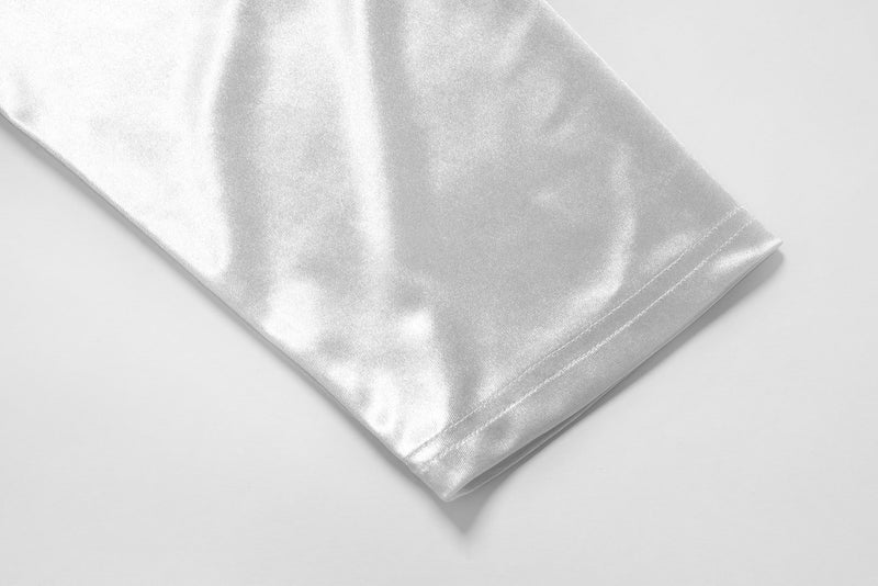 Close-up of smooth white satin sleeve cuff on the long sleeve jersey