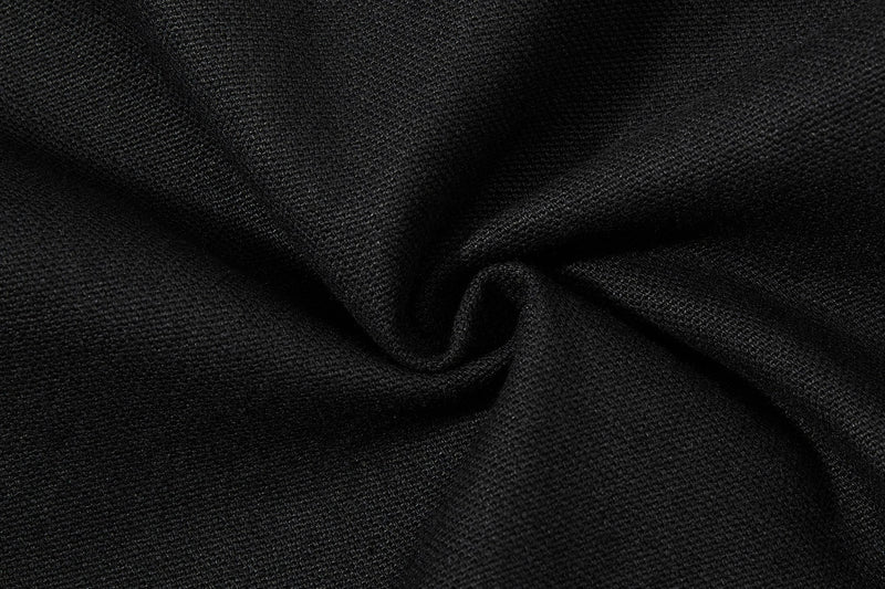 Close-up of black denim fabric texture with soft folds