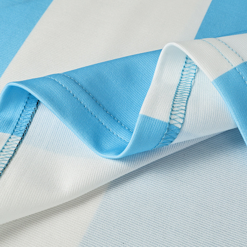 Close-up of a blue and white striped football jersey with smooth athletic fabric and stitched trim