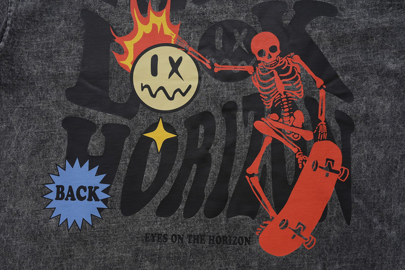 Vintage wash black graphic tee with red skeleton skater, flaming smiley face, and bold BACK print