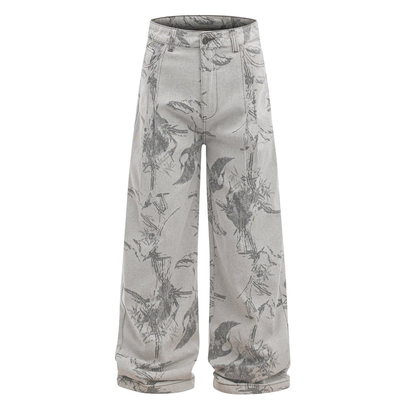 Front view of wide-leg gray jeans with abstract ink-wash brushstroke print