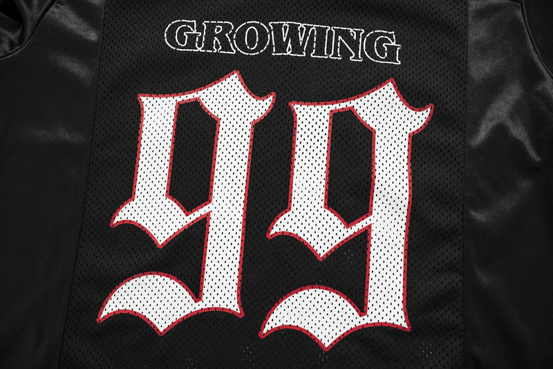 Black oversized mesh football jersey tee with Gothic lettering and large white-red graphic print