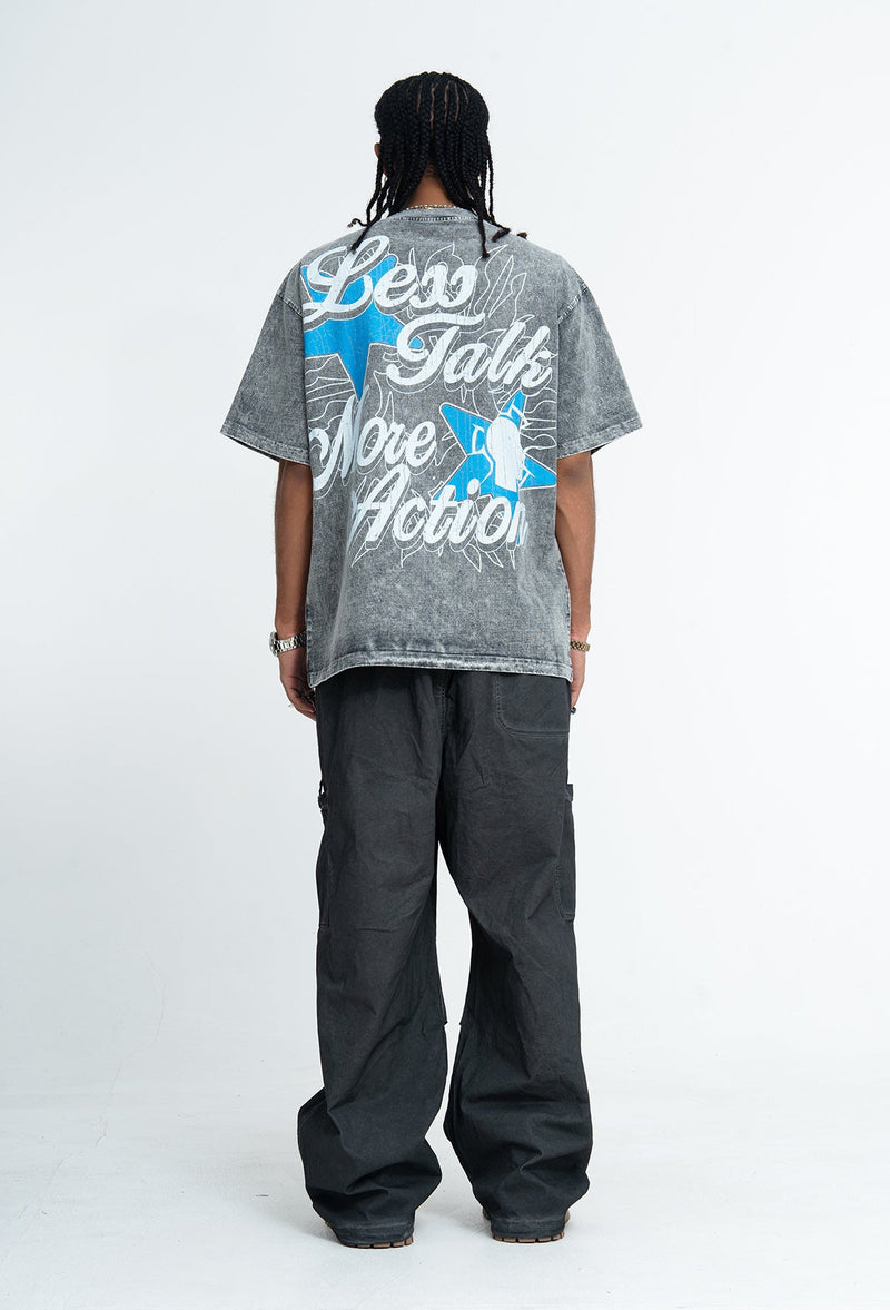 Vintage washed gray graphic T-shirt with oversized back print reading lead talk move motion in blue and white