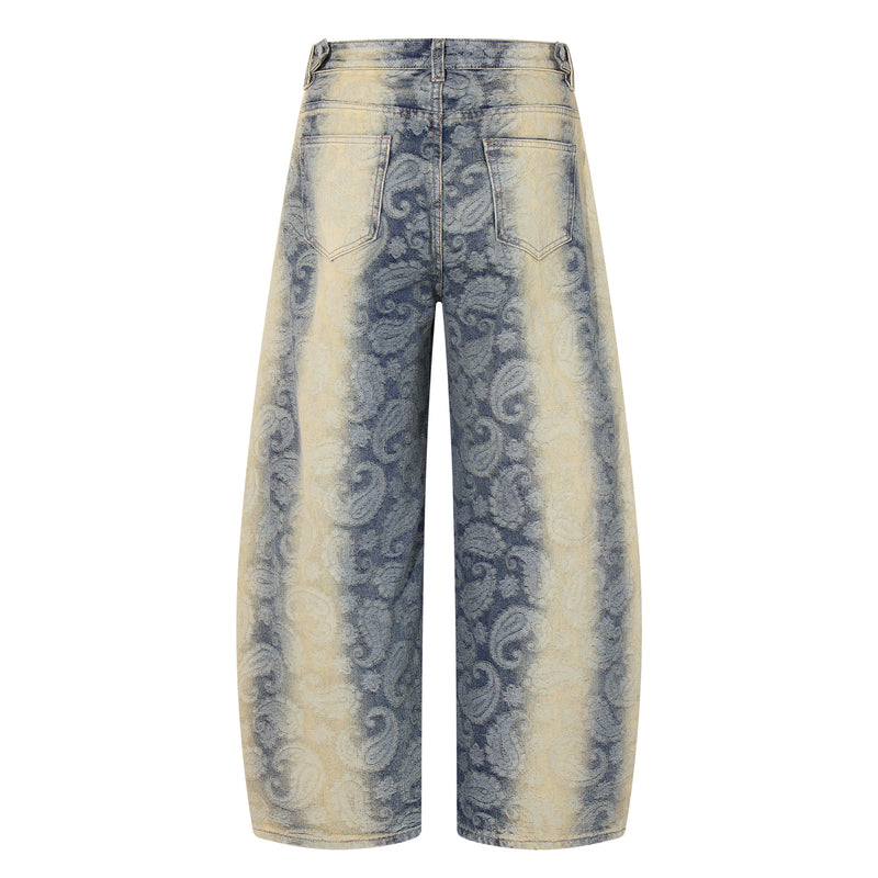 Back view of wide-leg jeans with paisley spray-fade wash