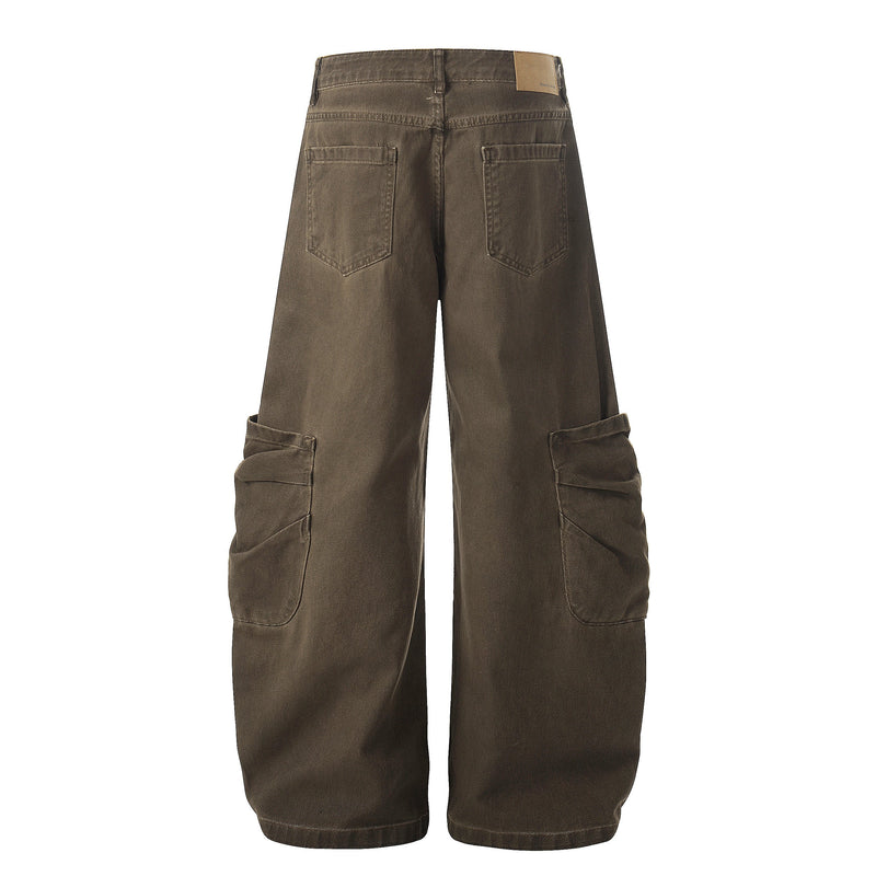 Back view of brown washed cargo pants with patch back pockets and wide legs