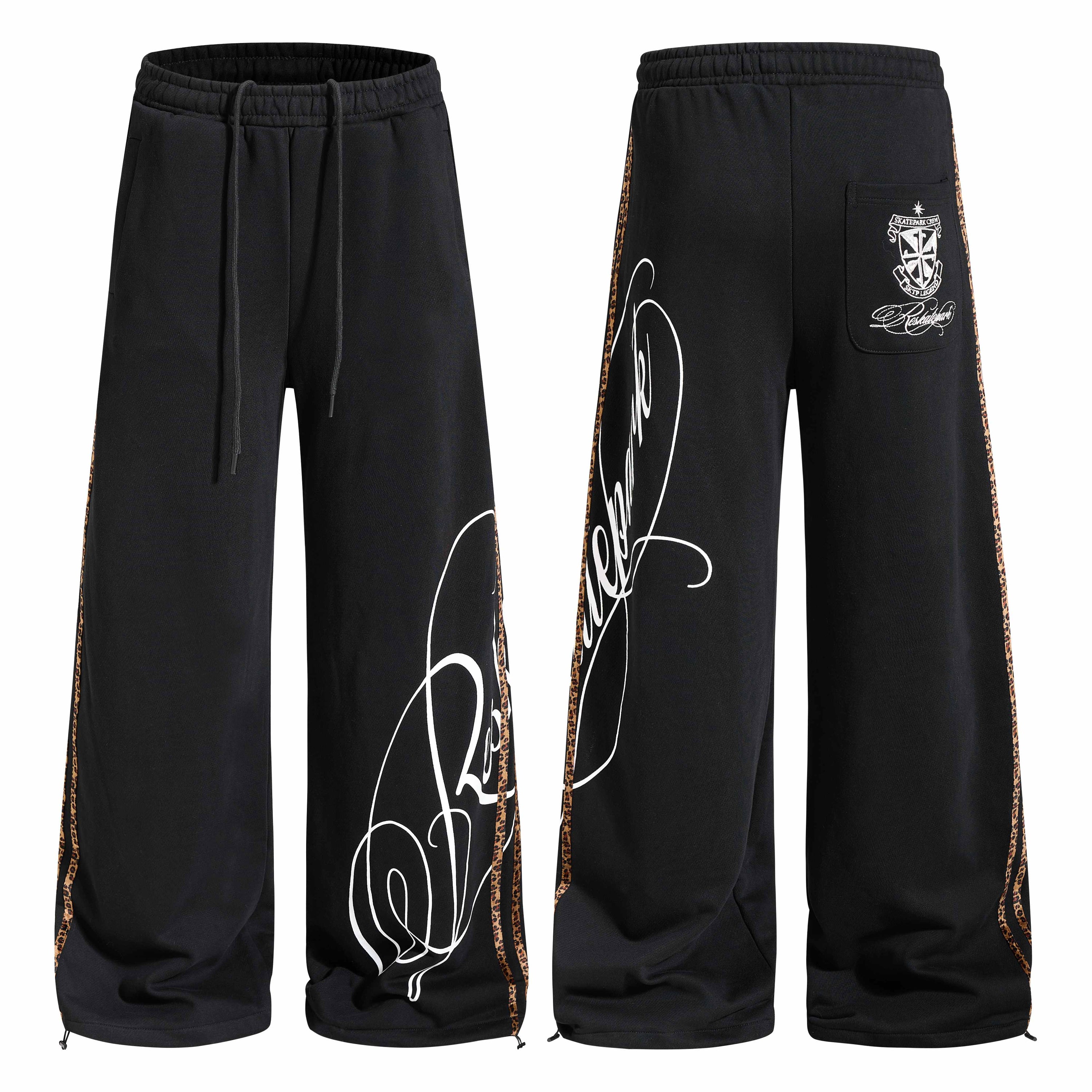 Black wide-leg sweatpants with leopard side stripe panels and white script graphic print, front and back view