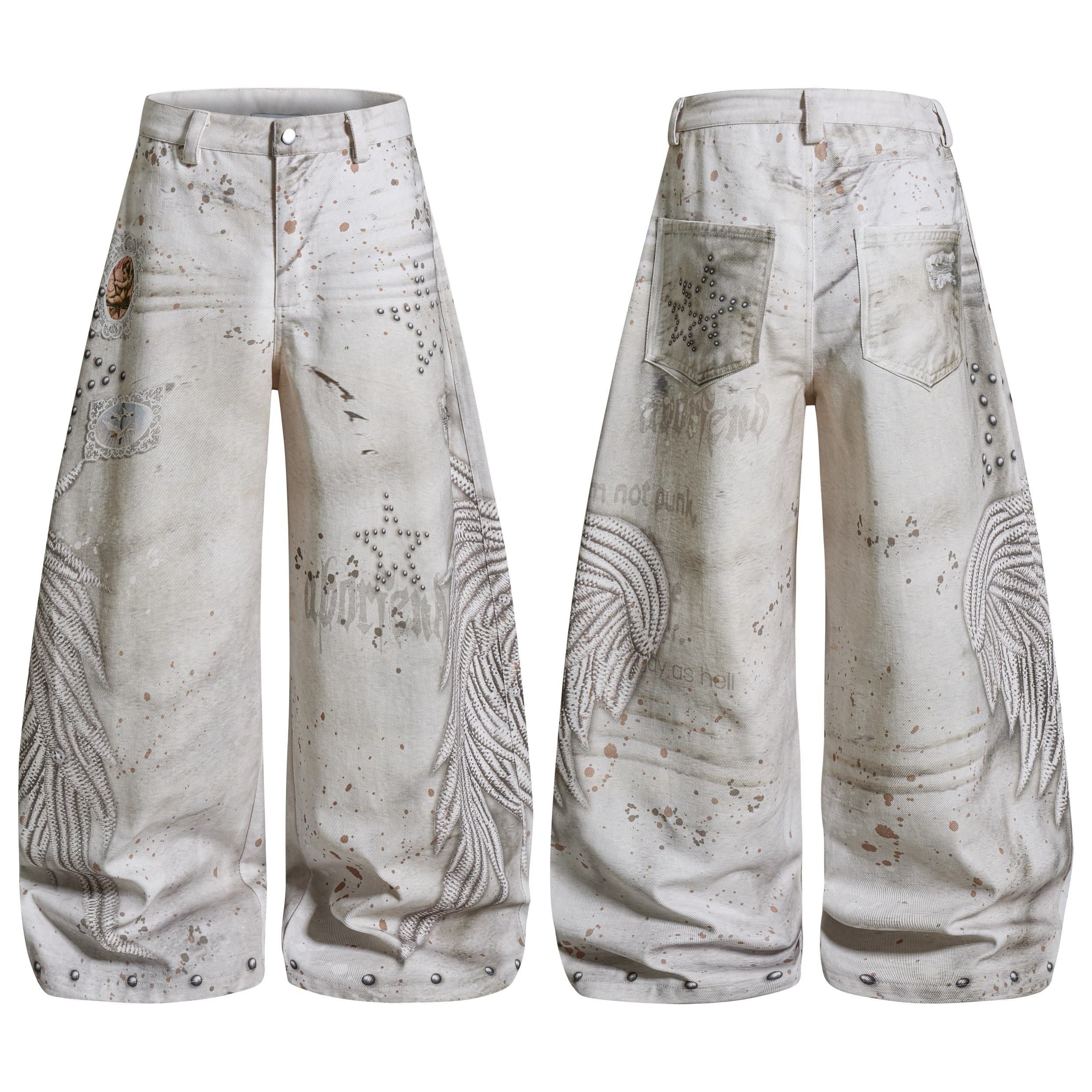 Washed ivory wide-leg balloon jeans with embroidered angel wings, metallic studs, and paint splatter, shown front and back