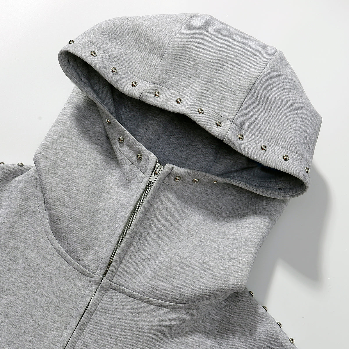 Omirad Studded Arc Zip Hoodie | Metal Stud Detail Streetwear