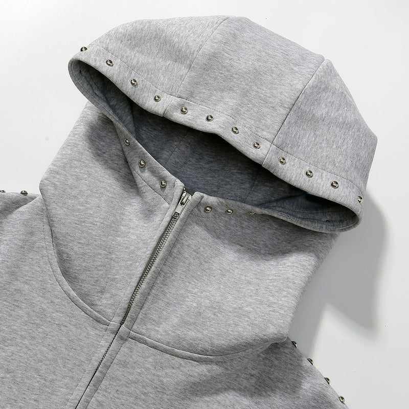 Gray zip hoodie close-up of hood and top zipper with metal studs