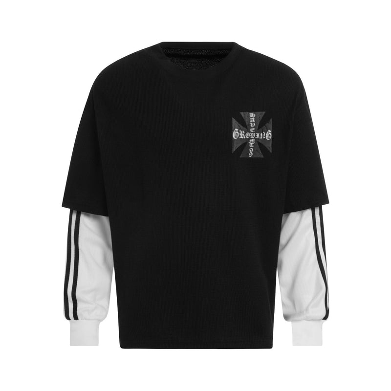 Black layered long sleeve tee with white underlayer and small gothic cross chest print, front view