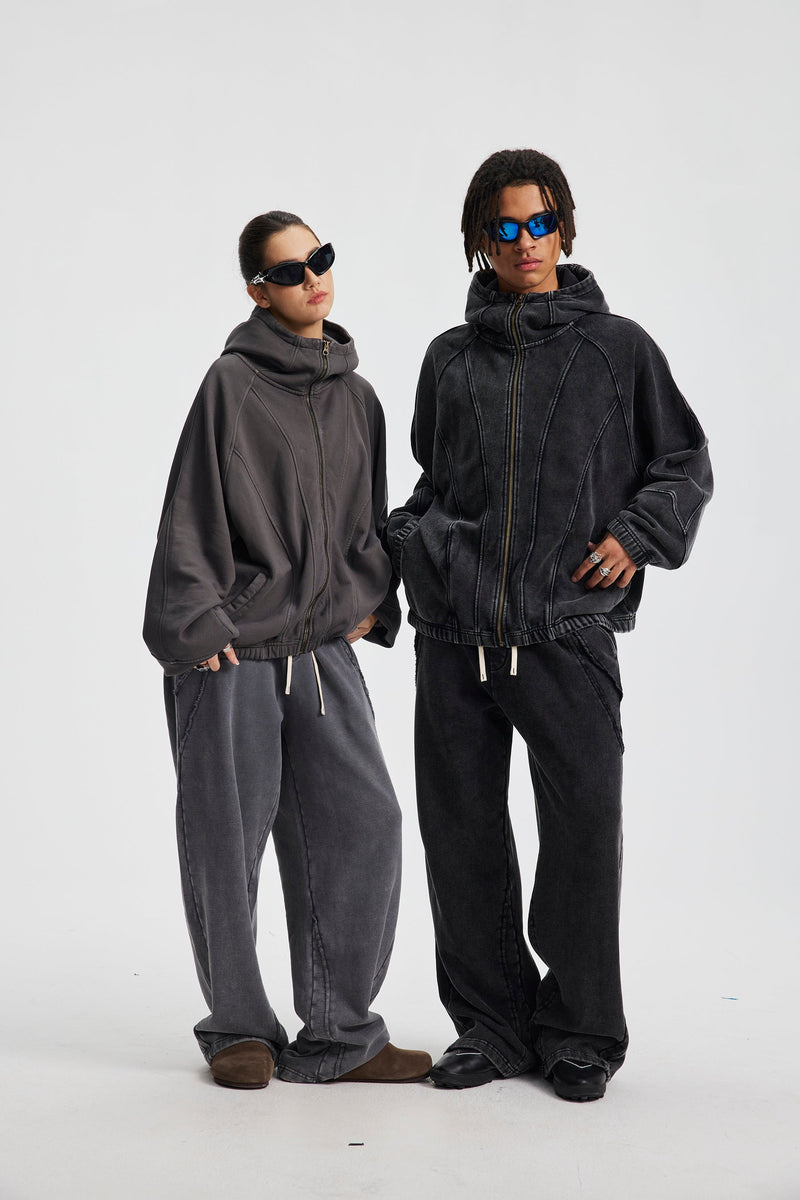 Two models wearing gray and black hoodies, three-quarter front view
