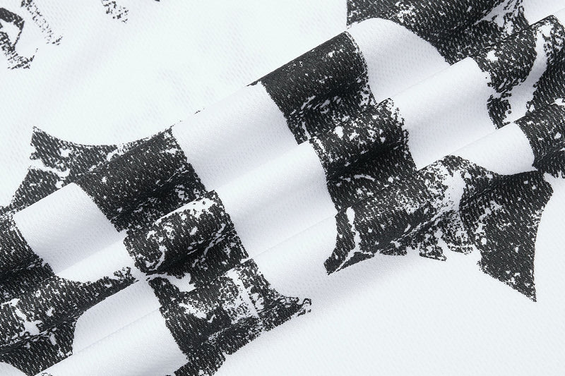 Close-up of white mesh gothic streetwear jersey with bold black distressed check pattern