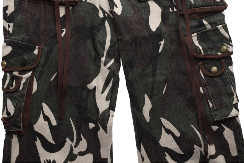 Close-up of camo cargo pants thigh pockets and hanging drawstrings