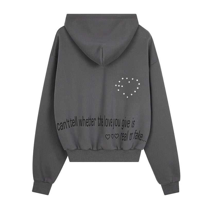 Back view of charcoal gray hoodie with rhinestone heart detail and text graphic