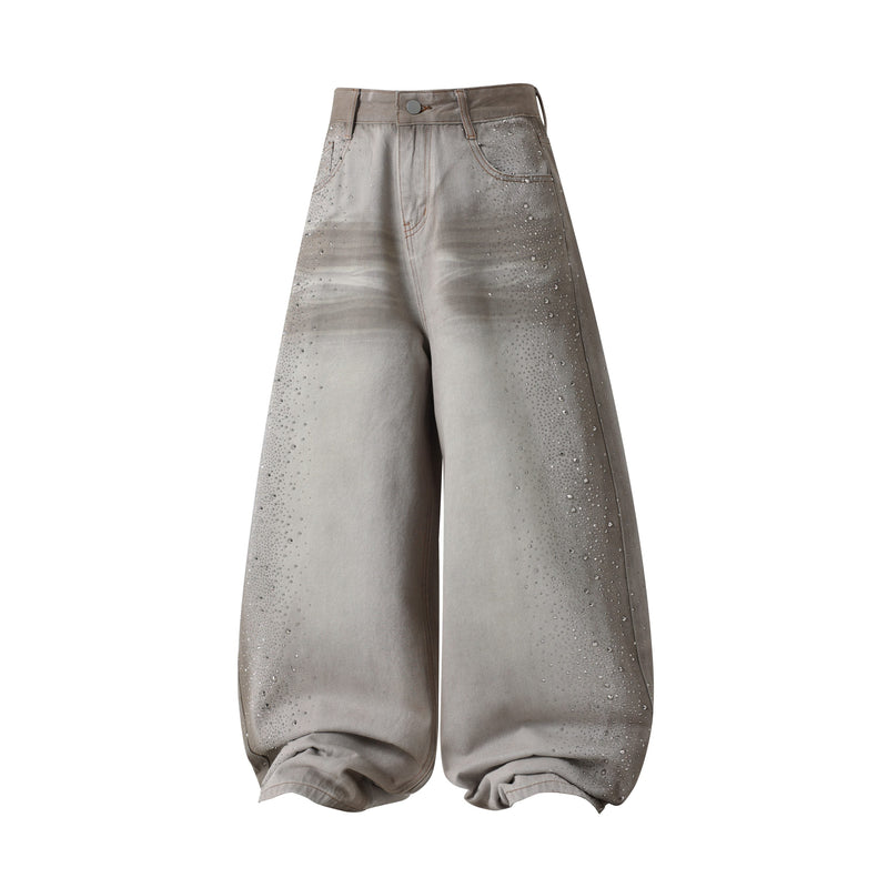 Front view of light gray washed balloon-fit jeans with rhinestone detailing and wide legs
