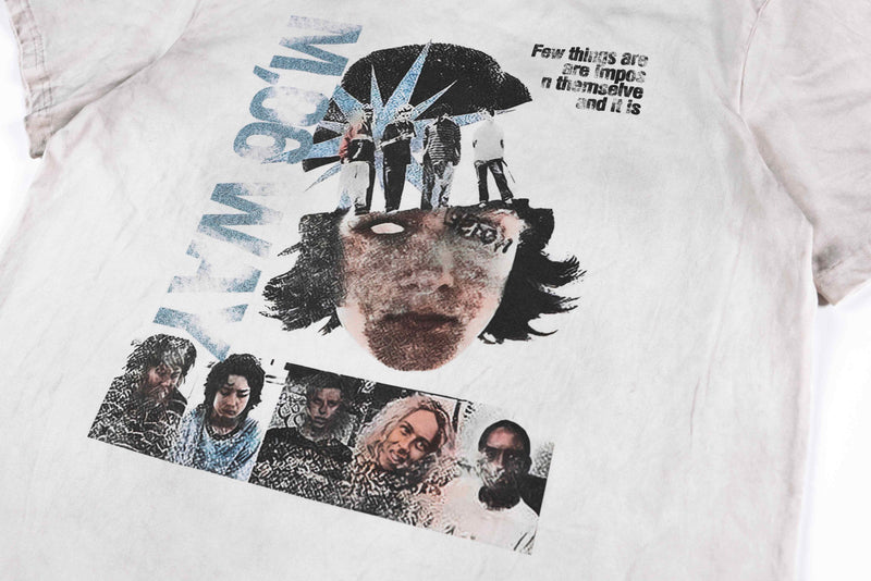 Vintage washed white graphic tee with collage portraits, blue typography, and edgy Y2K streetwear design
