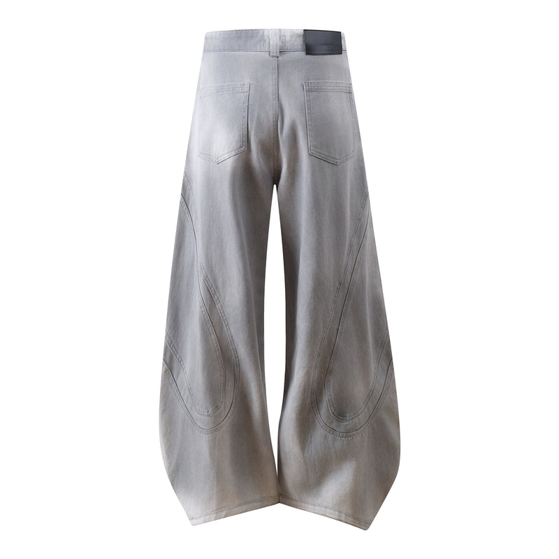 Back view of light gray wide-leg jeans with patch pockets and black logo waistband label