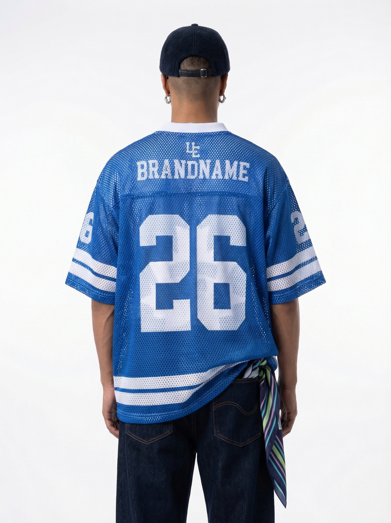 Blue mesh jersey T-shirt with white number 26 and BRANDNAME print, styled as a relaxed varsity streetwear top