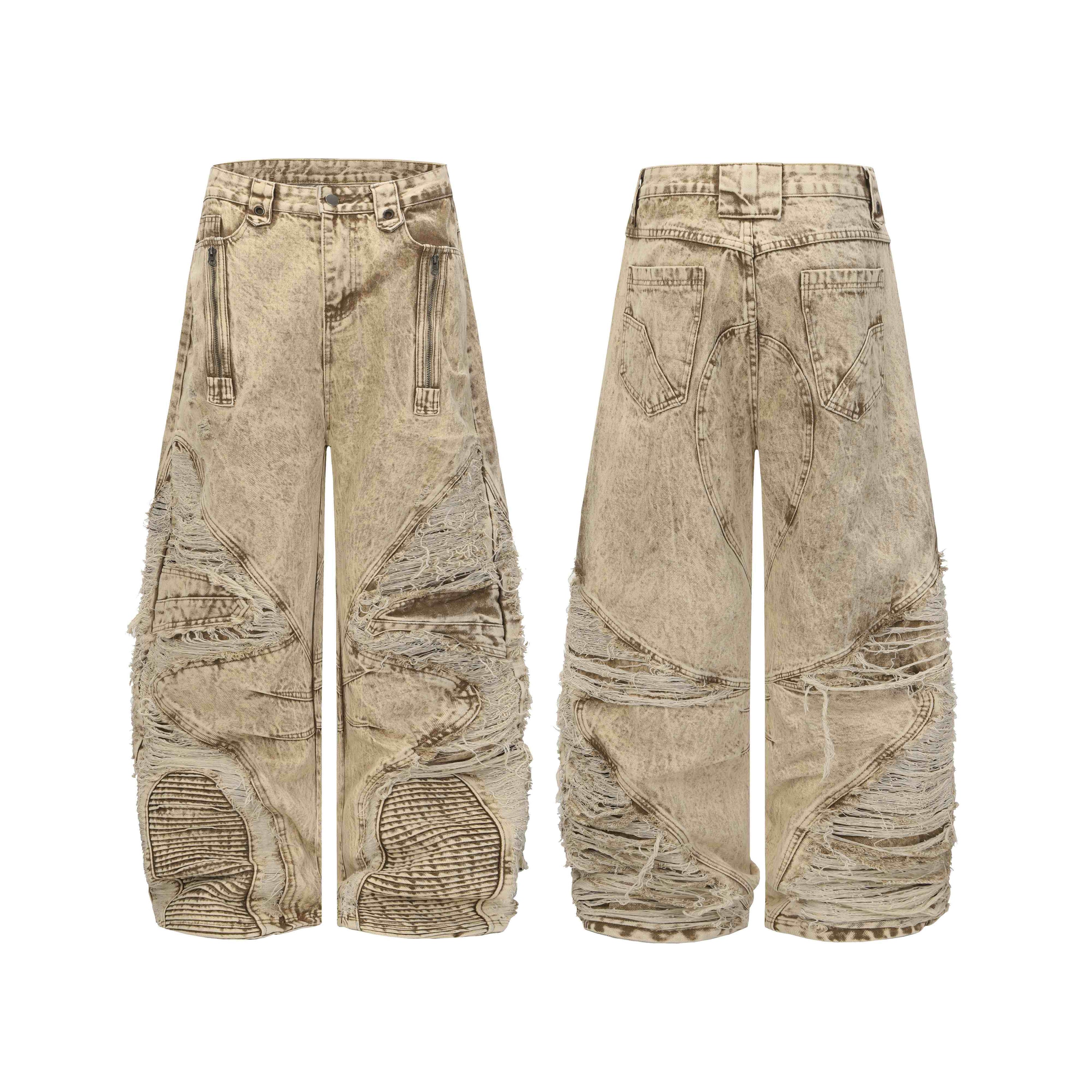 Front view of Omirad wide leg vintage distressed panel jeans in sand-washed denim with frayed raw edges and sculpted knee pan