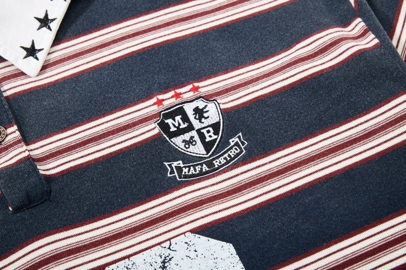Navy vintage striped rugby polo shirt with embroidered crest, star details, and retro 90s graphic styling