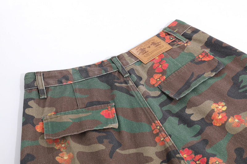 Close-up of back waistband and pockets on floral camo cargo shorts