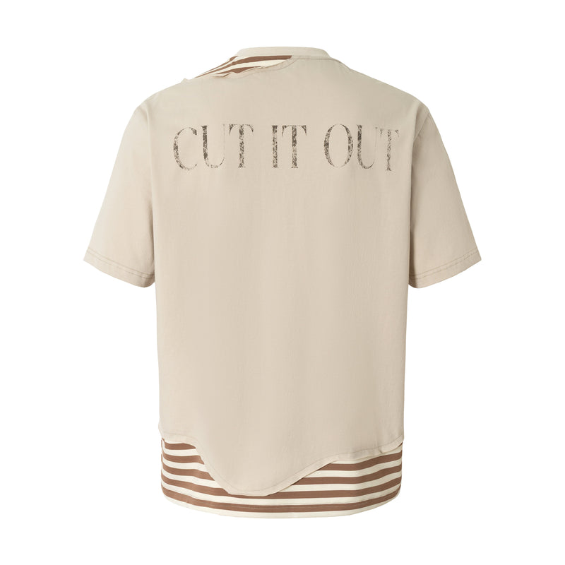 Beige layered streetwear tee with distressed CUT IT OUT graphic and striped hem detail on the back