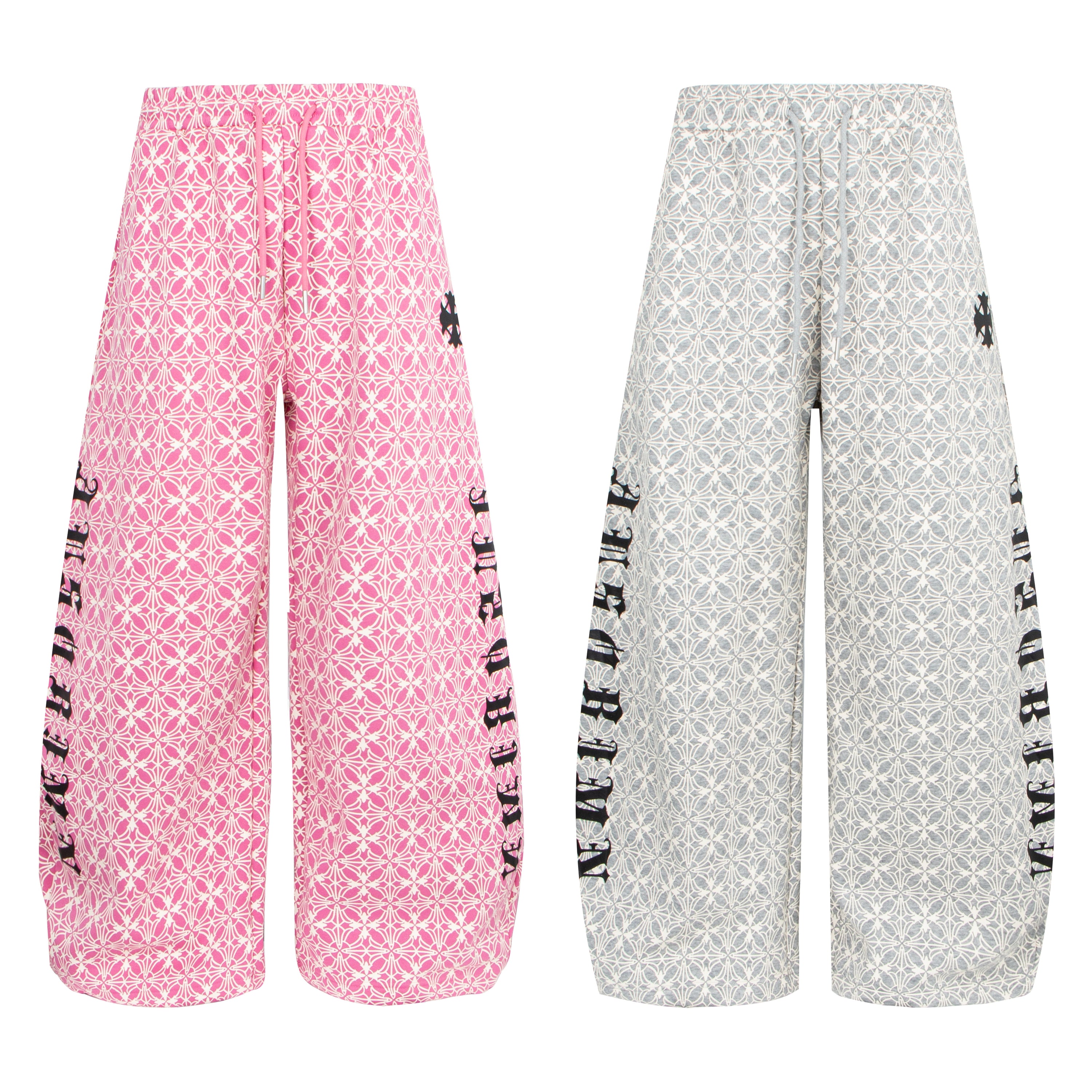 Pink and grey all-over geometric print wide-leg pants with black side graphic lettering, shown flat on white background