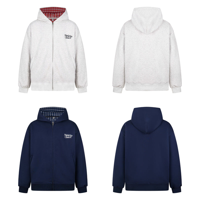 Front and back views of a light gray zip-up hoodie with red plaid lining and MadeNoChoice chest logo