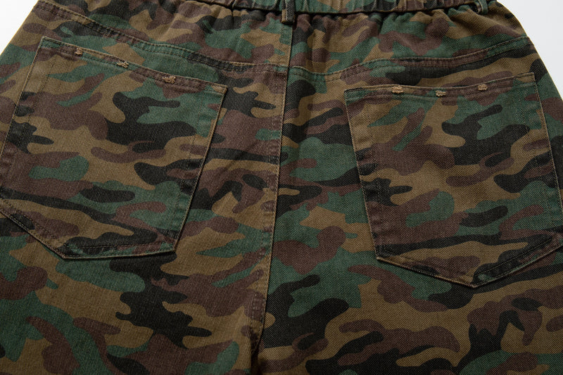 Close-up of back patch pockets on woodland camo wide-leg pants