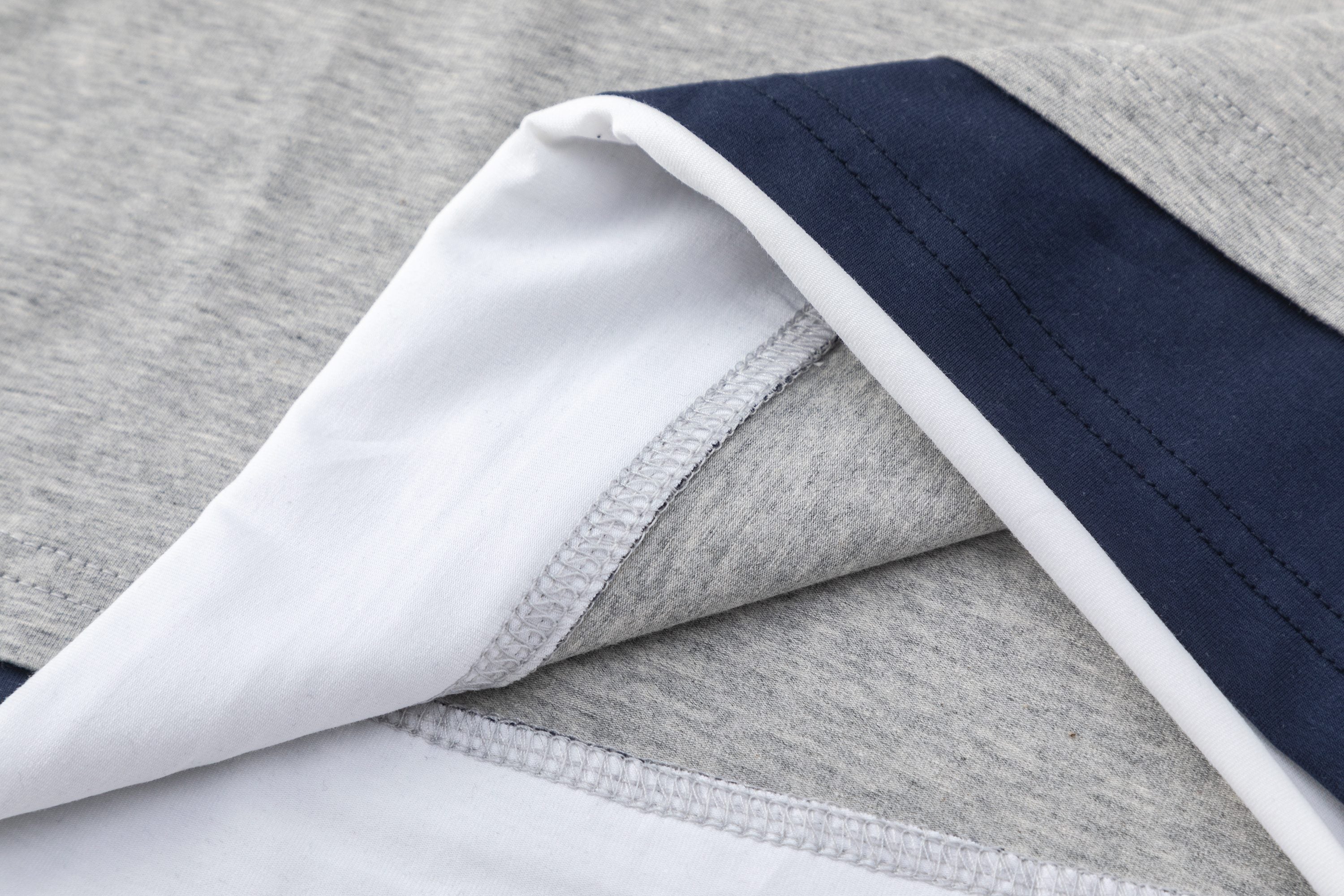 Colorblock Raglan T-Shirt | Contrast Sleeves & Layered Hem