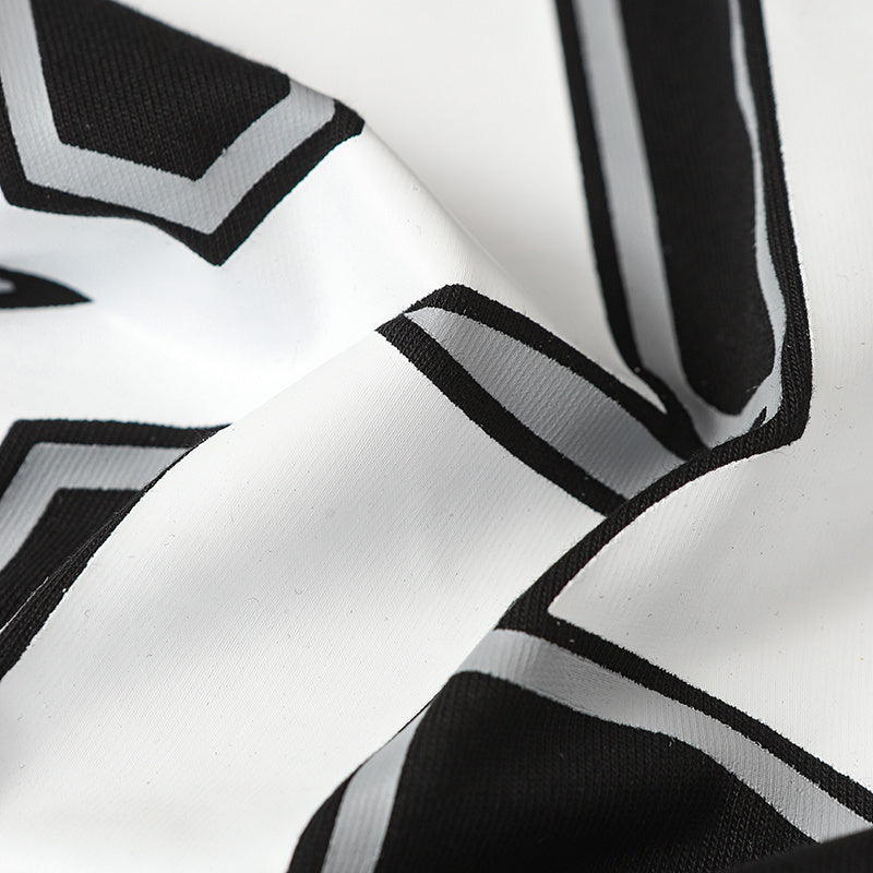 Close-up of black and white Gothic football jersey fabric with bold number 89 detailing