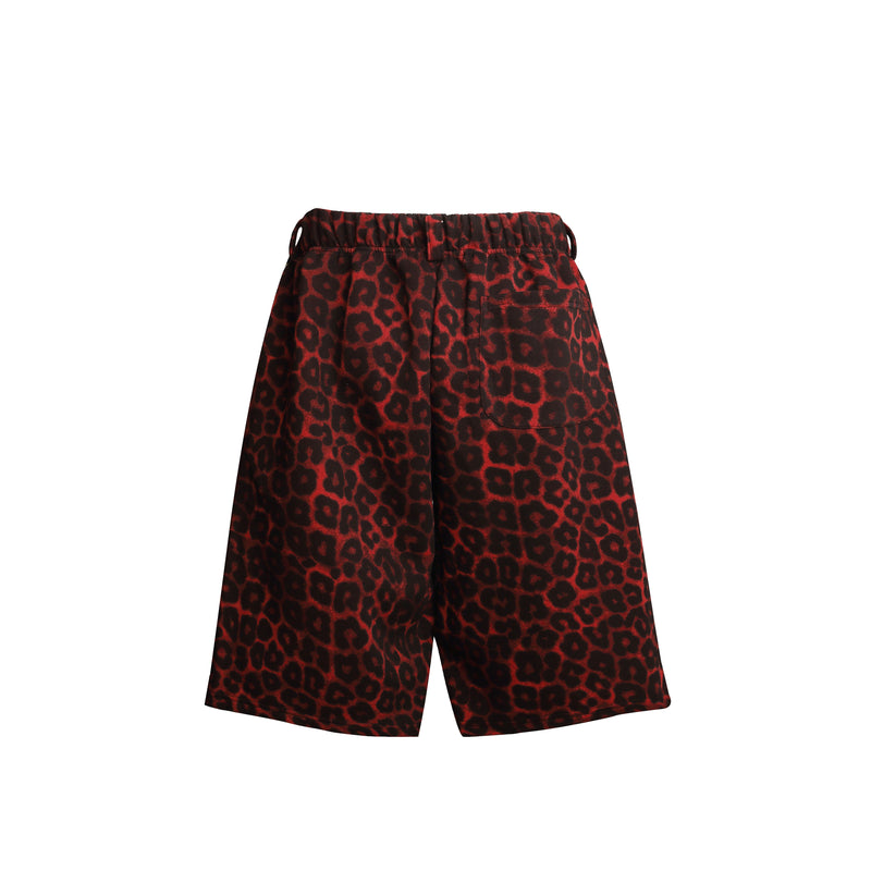 Back view of red and black leopard print loose shorts with a single patch pocket