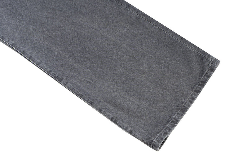 Hem detail of wide leg grey denim pants with stitched cuff finish