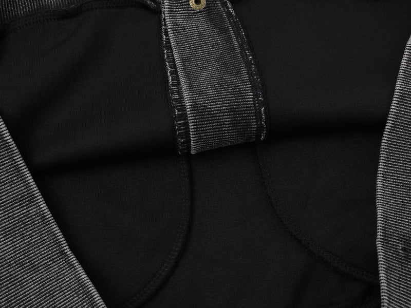 Close-up of black jacket hood lining and ribbed collar detail