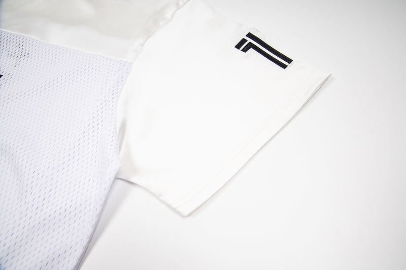 White mesh football jersey sleeve with black number 7 detail and breathable streetwear fabric